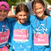 Three Girls on the Run participants smiling at 5k
